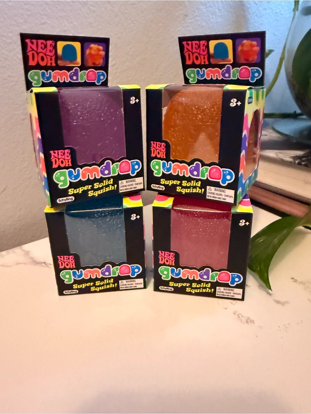 Super Solid Squish! Toy - Purple, Orange, Blue, Pink Set